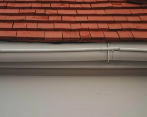 Roof with gutter damage needing repair